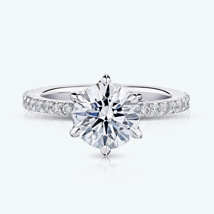 SOLITAIRE ENGAGEMENT RING with LOTUS basket