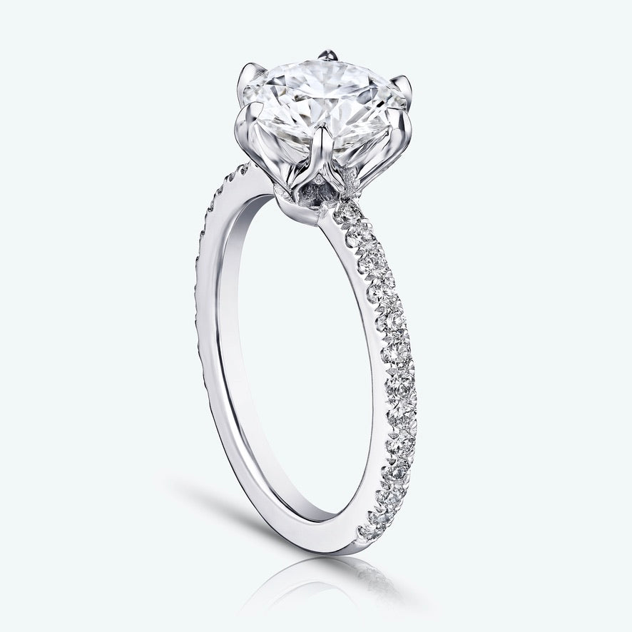 SOLITAIRE ENGAGEMENT RING with LOTUS basket